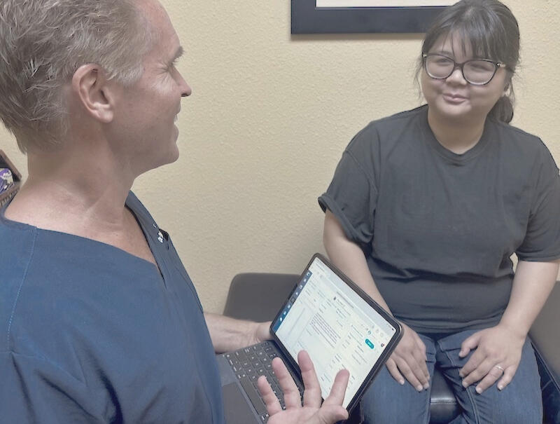 Back pain first visit in SCV Patient beginning a back pain chiropractic evaluation during a first visit with Dr. Thomas Polucki in Santa Clarita.
